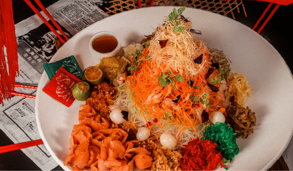 CNY catering featuring a plate of yusheng